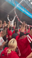 College Football Fans Build Giant Beer Cup Snake as Free Drinks Flow at Dublin Stadium