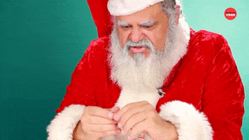 Unwrapping Santa Claus GIF by BuzzFeed