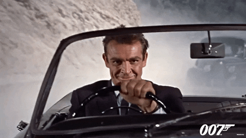 Driving Road Trip GIF by James Bond 007 - Find & Share on GIPHY