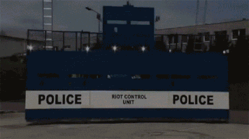 new police wall riot vehicle GIF