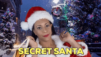Holiday gif. Woman dressed as Mrs. Claus stands in front of a backdrop of a wintry street with snow-topped trees sprinkled with Christmas lights. She smiles widely and raises her eyebrows as she holds up two gift bags. Text at the bottom reads, "Secret Santa."