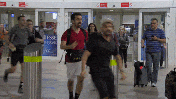 cbs excited running the amazing race GIF