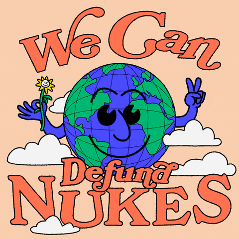 Text gif. Smiling Earth holding a happy flower in one hand and a peace sign in the other, surrounded by the message "We can defund nukes" against a peach background.