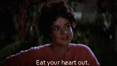 Gif of Rizzo from Grease saying "eat your heart out"