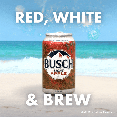 Sponsored gif. Can of Busch Light beer in the apple flavor stands on a beach. Waves roll in behind it and fireworks explode in the sky overhead. Text reads, “Red, white, and brew.”