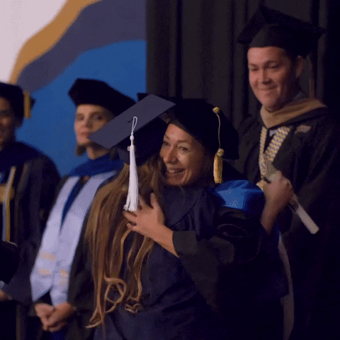 FIU happy hug college graduation GIF