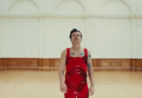 Harry Styles in red costume in As it Was music video