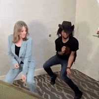 marianne williamson dancing GIF