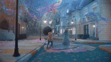 Music video gif. Taylor Swift and Brendon Urie sing in a street as multicolor paint explodes in the air and rains down around them, Brendon popping open an umbrella over Taylor.