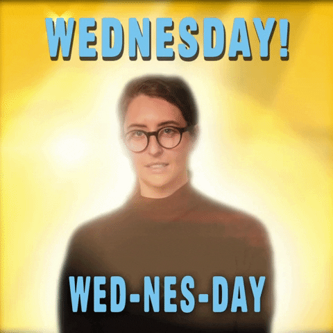 Video gif. Woman wearing glasses and a turtleneck surrounded by an angelic glow against a bright yellow background. Text reads, "Wednesday! Wed-nes-day."