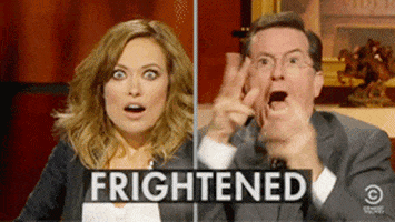 scared the colbert report GIF