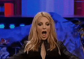 Celebrity gif. Britney Spears opens her mouth wide in surprise then looks around as if to say, "Can you believe this?"