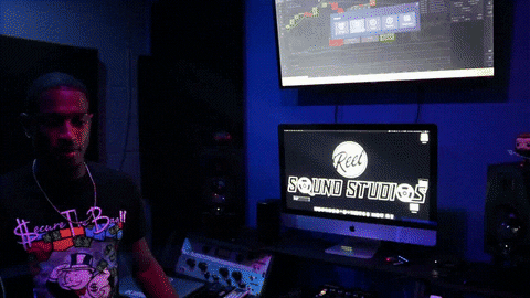 Gif of many in a recording studio.