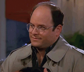 Seinfeld gif. Jason Alexander as George scoffs, rolling his eyes and raising his eyebrows as if to say, “whatever.”