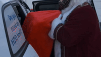 Dad With COVID Hires Santa to Surprise Kids With Christmas Presents