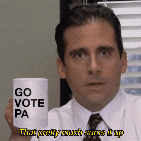 The Office gif. Steve Carrell as Michael Scott holds up a mug that reads “Go Vote PA” and says, “That pretty much sums it up.

