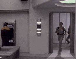 TV gif. Bunch of recruits are running through the spaceship in Star Trek: The Next Generation.