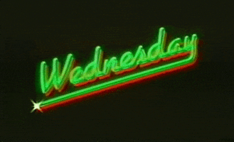 Text gif. Text, "Wednesday," is written in retro font and glows neon green with a red shadow.