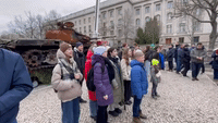 Children Sing as Destroyed Russian Tank Parked in Front of Russian Embassy in Berlin
