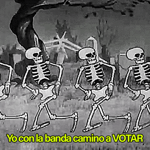 Disney gif. Chorus line of skeletons dance in unison. Text, in Spanish, "Yo con la banda camino a votar."