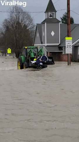 Farmers Help Community To Safety After Historic Flooding GIF by ViralHog