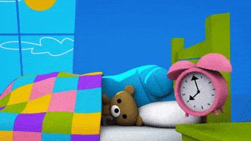 Cartoon gif. From Storybots, a sleeping teddy bear being woken up by a pink alarm clock, uses a jumbo robot arm to slap the snooze button.