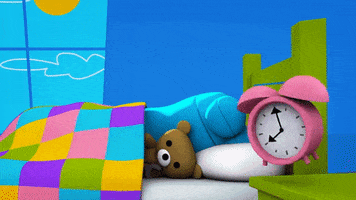 Cartoon gif. From Storybots, a sleeping teddy bear being woken up by a pink alarm clock, uses a jumbo robot arm to slap the snooze button.