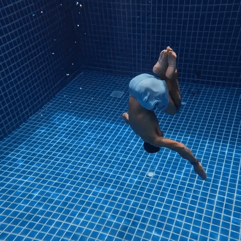 Under Water Swimming GIF by Storyful