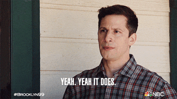 TV gif. Andy Samberg as Jake Peralta on Brooklyn Nine-Nine looks serious and stern, nodding subtly and saying "yeah. Yeah it does."