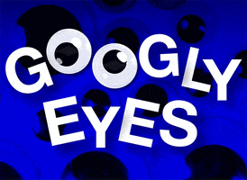 Text gif. With a background full of blue googly eyes, reads the message, “Googly eyes.” Two googly eyes make the two o’s.