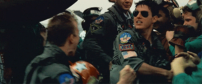 happy tom cruise GIF