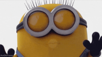 Movie gif. A Minion from Despicable Me kisses the screen.