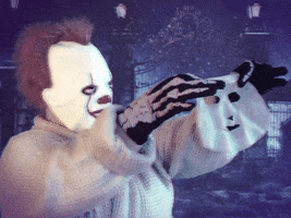Person adorned in a cheap Pennywise clown mask, black skeleton gloves, and a comfy bathrobe presents a transparent skin care face mask to us before smoothing it onto their face, leaning back and really basking in the feeling. Even murderous clowns need some pampering from time to time. 