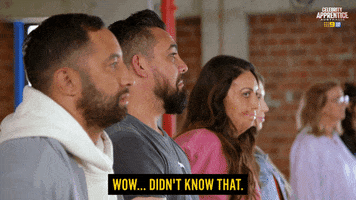 Reality TV gif. Ronnie from Celebrity Apprentice Australia stands among a row of other competitors, turning to one shaking his head with pleasant surprise and saying, "wow...didn't know that."