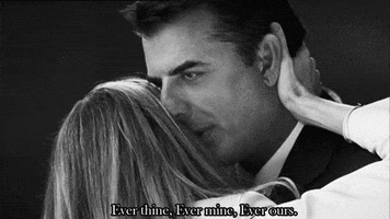 TV gif. Sarah Jessica Parker as Carrie in Sex and the City smiles while holding onto Chris Noth as Mr. Big as he whispers in her ear. Text, "Ever thine, ever mine, ever ours."