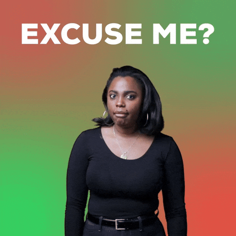 Video gif. Realtor Hope Sinclair tilts her head and gestures to the side with a hand, giving us wide eyes like she's drawing your attention to someone irritating or embarrassing. Text, "Excuse me?'