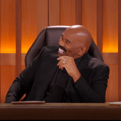 Reality TV gif. Steve Harvey, in Judge Steve Harvey, sits in his chair and leans on his elbow, nodding and laughing. Text, "yeah."