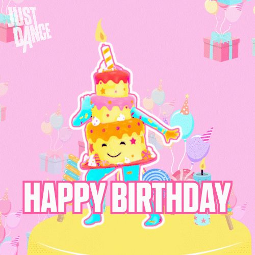 Cartoon gif. An avatar with the body of an elaborate yellow cake does the twist on top of a stage with candles and lollipops. Balloons with party hats carry gifts into the air and confetti sprays in the background. Text, "Happy birthday."
