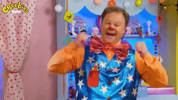 TV gif. A clown from CBeebies smiles widely at us and gives us a double thumbs up.