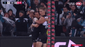 steven motlop hug GIF by AFL