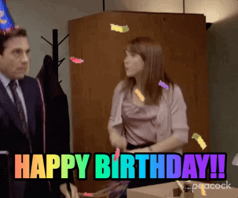 Gif s tancujícím oslavujícím párem s narozeninovou čepičkou, konfetami a nápisem Happy Birthday.