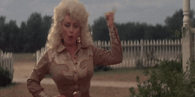 dolly parton pointing GIF