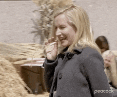 The Office gif. Angela Kinsey as Angela struts with a piece of hay in her mouth. Text, "Hay."