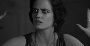 Celebrity gif. Shocked Eva Green raises her hands as if to say “Stop,” then shakes her head and waves a hand in front of her face as if to say, “Don’t tell me, I don’t want to know.”