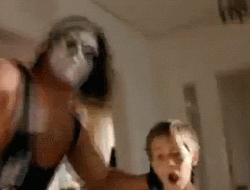wwe beat up GIF