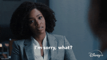 Marvel gif. Teyonah Parris as Monica Rambeau is clad in a sharp gray blazer as she closes her eyes in a confused frustration, saying, "I'm sorry, what?," which appears as text.