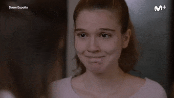 TV gif. Clip of Nicole Wallace as Nora and Celia Monge as Viri in Skam Espana. Nora runs over to Viri and Viri opens her arms to hug her tightly.