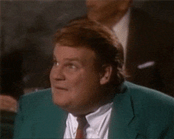 SNL gif. Chris Farley leans forward over a cafe table and asks, incredulously, "What?" Then, furiously angry, he stands up and flips the table, shouting, "Why you son of a bitch, you no good..." Meanwhile, his dining companion tries to restrain him.