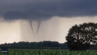 Twin Funnel Clouds Briefly Intertwine in Ontario Sky