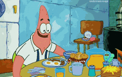 SpongeBob gif. A happy Patrick lifts a table full of breakfast foods to his mouth and chomps as they slide effortlessly down his throat.